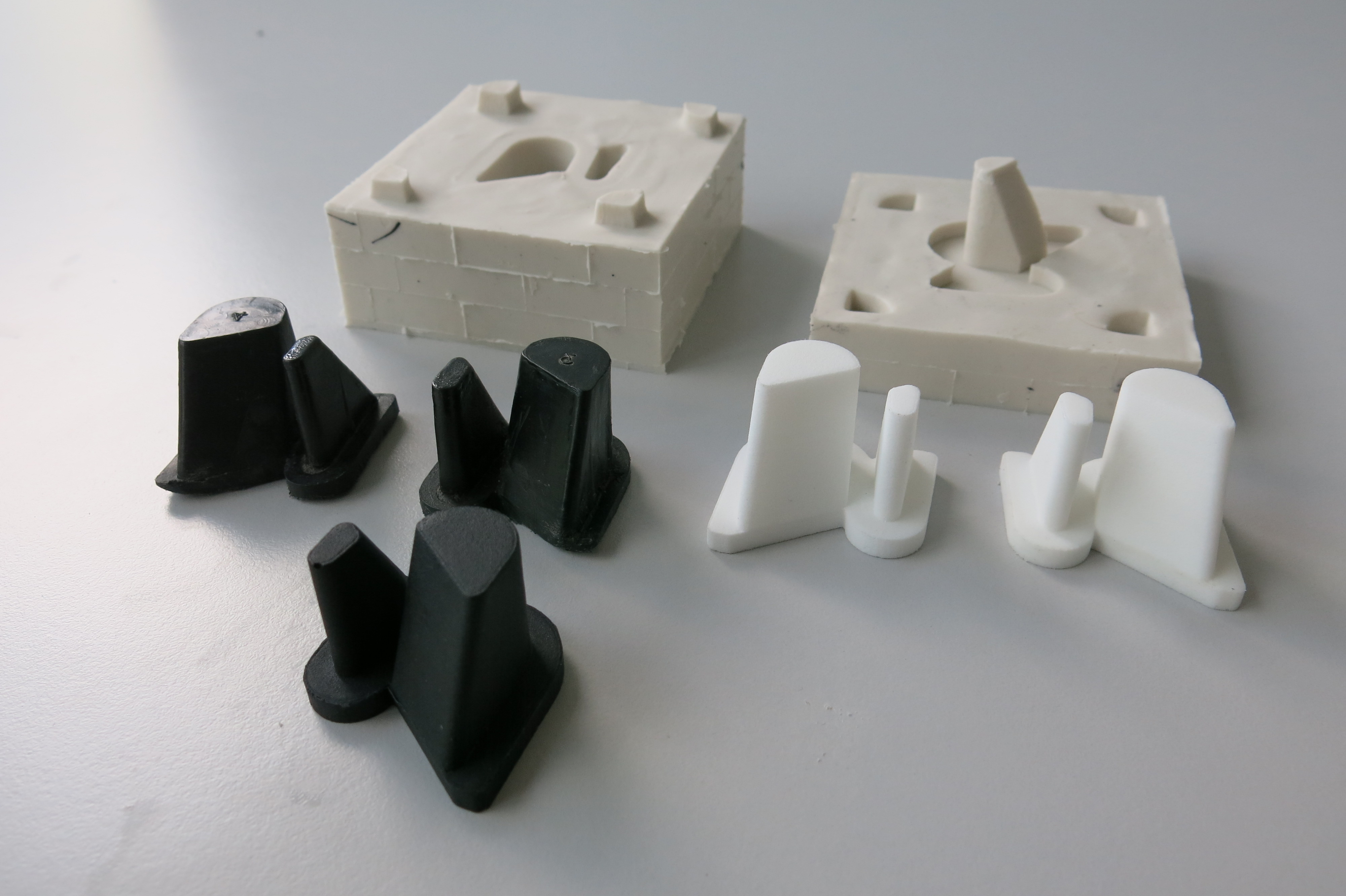 Make silicone mold in two parts per casting